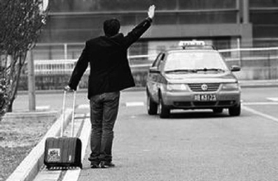 招手即停出租车乘降点成街边"摆设"
